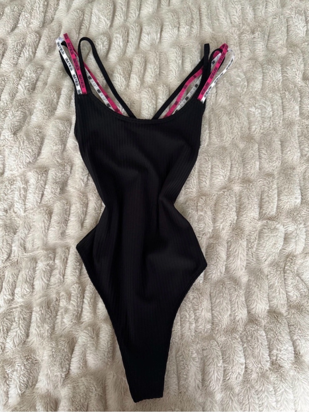 Black Ribbed One-Piece Bodysuit with Pink & White Accent Straps